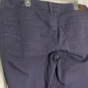 purple American eagle skinny jeans flawed